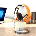 Modern Office Desk Setup With Laptop Headphones Plant Decorative Paintings And Blinds