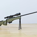 Green and Black Sniper Rifle With Scope And Tripod Stand On Wooden Floor