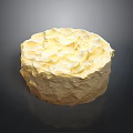 Round Creamy Textured Cake With Smooth Yellow Surface And Decorative Topping