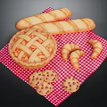 Assorted Baked Goods Including Pie Baguettes Croissants And Cookies On Red White Checkered Cloth
