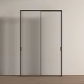 Modern Sliding Door With Black Frame And Ribbed Glass For Interior Space