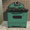 Vintage Green Kitchen Stove With Four Burners On Tiled Floor And Wall