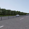 Well Paved Municipal Road Featuring Metal Guardrail Lush Street Trees And Passing Vehicle
