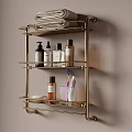 Bathroom Essentials On Wall Mounted Metal Shelf With Folded Towels Bath Products Toothbrush And Glass