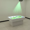 Commercial Showcase Equipment With Green Lighting And Green Items On Gray Platform And Lower Cabinets