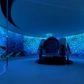 Blue Illuminated Interior With Aquarium Walls Comfortable Seat And Circular Design