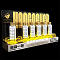 Elegant Wine Bottles And Glasses Display On Gold Stand With Multiple Shelves