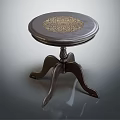 Round Wooden Dining Table With Golden Floral Pattern And Carved Curved Legs