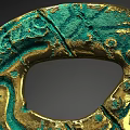 Ancient Bronze Mask With Green And Gold Intricate Decorative Patterns