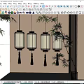 Traditional Hanging Lanterns With Tassels And Warm Yellow Light Near Bamboo Leaves