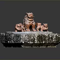 Traditional Stone Carving With Large Lion And Small Cubs On Textured Base
