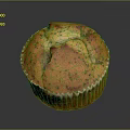 Golden Brown Poppy Seed Muffin In Paper Liner With Cracked Top