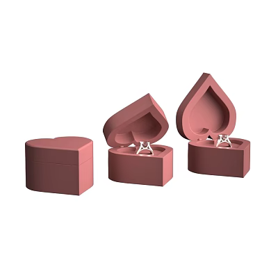 Pink Heart and Teardrop Shaped Jewelry Boxes with Open Lids Holding Rings Inside 3d model