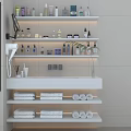 Modern Bathroom Accessories Organized on Shelves With Towels And Toiletries