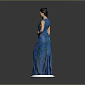 Child In Blue Long Dress Standing On White Base With Gray Background