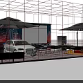 Modern Stage Setup With White Audi Red Sports Car Umbrellas Tables And Colorful Backdrop
