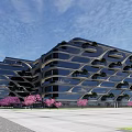 Modern Architectural Building With Unique Curved Glass Facade And Pink Flowering Trees