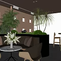 Lounge Area Interior Design With Comfortable Seating Green Plants Natural Light And Coffee Table