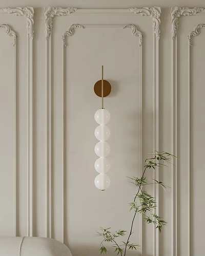 Gold Base Wall Lamp With White Globe Shades On Light Vertical Striped Wall And Greenery 3d model