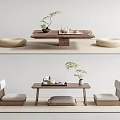 Japanese Wooden Tea Table and Chairs With Woven Floor Cushions Potted Plant and Tea Set