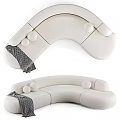White Curved Sectional Sofa With Decorative Round Balls And Gray Patterned Throw 3d model