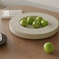 Green Apples Displayed On Light Colored Plate Over Wooden Table 3d model