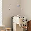Light Beige Kitchen Corner With Green Plant Wooden Cutting Board And Appliances