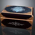 Elegant Decorative Ornament Set With Dark Box Gold Trim And Intricate Patterns