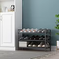 Multi Tier Shoe Rack With Various Shoes White Cabinet Light Blue Wall And Green Plant