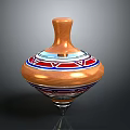 Decorative Wooden Spinning Top Featuring Colorful Red Blue White Patterns And Metal Base