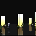 Event Passage In Black Background With Illuminated Yellow Pillars Green Plants And Reflective Floor