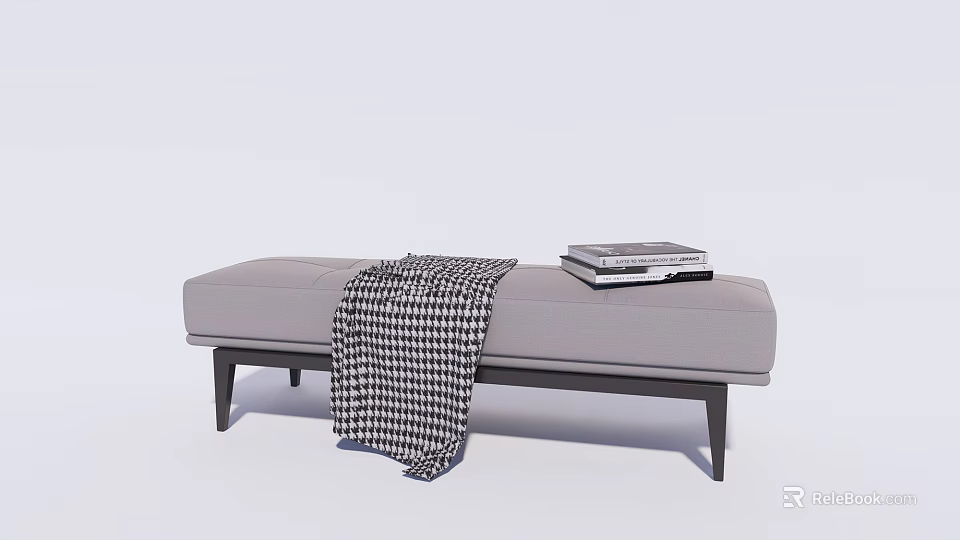 Gray Upholstered Ottoman Footstool With Black Wooden Legs Houndstooth Blanket And Stacked Books 3d model 