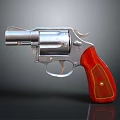Shiny Revolver With Silver Metal Frame And Red Grip Showing Surface Reflection