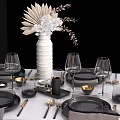 Elegant Tableware Set with Black Plates Gold Cutlery Wine Glasses And Linen Napkins