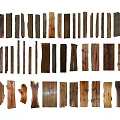 Stone Wood Wooden Pieces Displayed On Wall With Various Shapes Colors Arranged In Three Rows