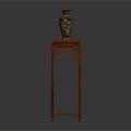 Carved Mahogany Flower Stand With Golden Patterned Vase On Top