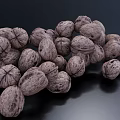 Organic Fresh Walnuts in a Pile on Black Background with Natural Shell Texture