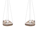 Stylish Rattan Hanging Chairs with Light Colored Cushions for Indoor Outdoor Spaces