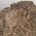 Pile of Mixed Garden Soil With Small Stones and Organic Matter