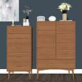 Light Wooden Entryway Cabinet And Side Cabinet With Drawers Books Vases On Blue Wall Artwork