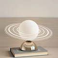 Modern Table Lamp With White Spherical Shade Transparent Rings And Golden Base