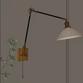Modern Brass Adjustable Arm Wall Lamp With Warm Light Shade And Green Plant