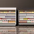 Black And White Commercial Refrigerator Display Cabinets With Glass Doors Holding Various Bottled Beverages