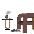 Modern Side Table With Vase Dried Flowers And Brown Chair Near Open Book
