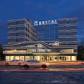 Modern Hotel Building Exterior With Illuminated Glass Facade Night Street View And Cars
