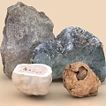 Natural Stone and Wood Pieces Displaying Raw Textures and Varied Shapes