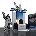 Michelin Display Stand Featuring Waving Michelin Man And Race Track Design