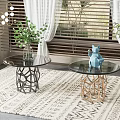 Black and Gold Coffee Tables with Glass Top and Metal Base in Modern Living Room