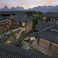 Traditional Chinese Homestay Architecture with Black Tile Roofs Mountain View and Outdoor Courtyard Seating