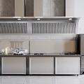 Modern Stainless Steel Kitchen Appliances Stove Range Hood and Refrigerator In Contemporary Kitchen Setup